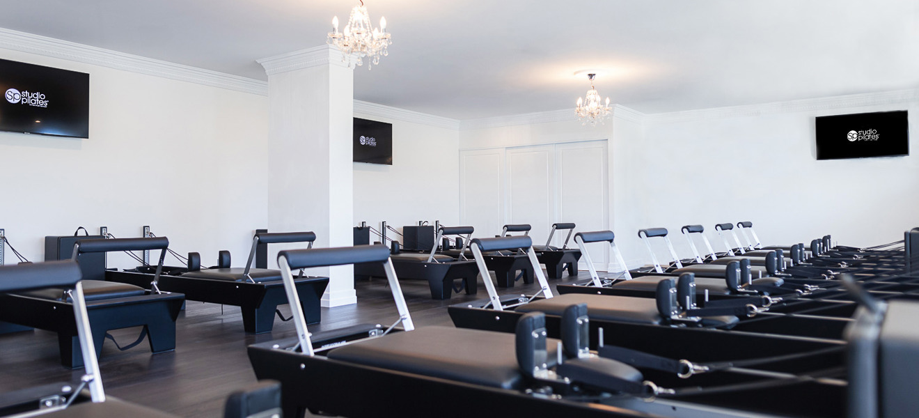 Pilates Studio Reformer Machines Chandeliers