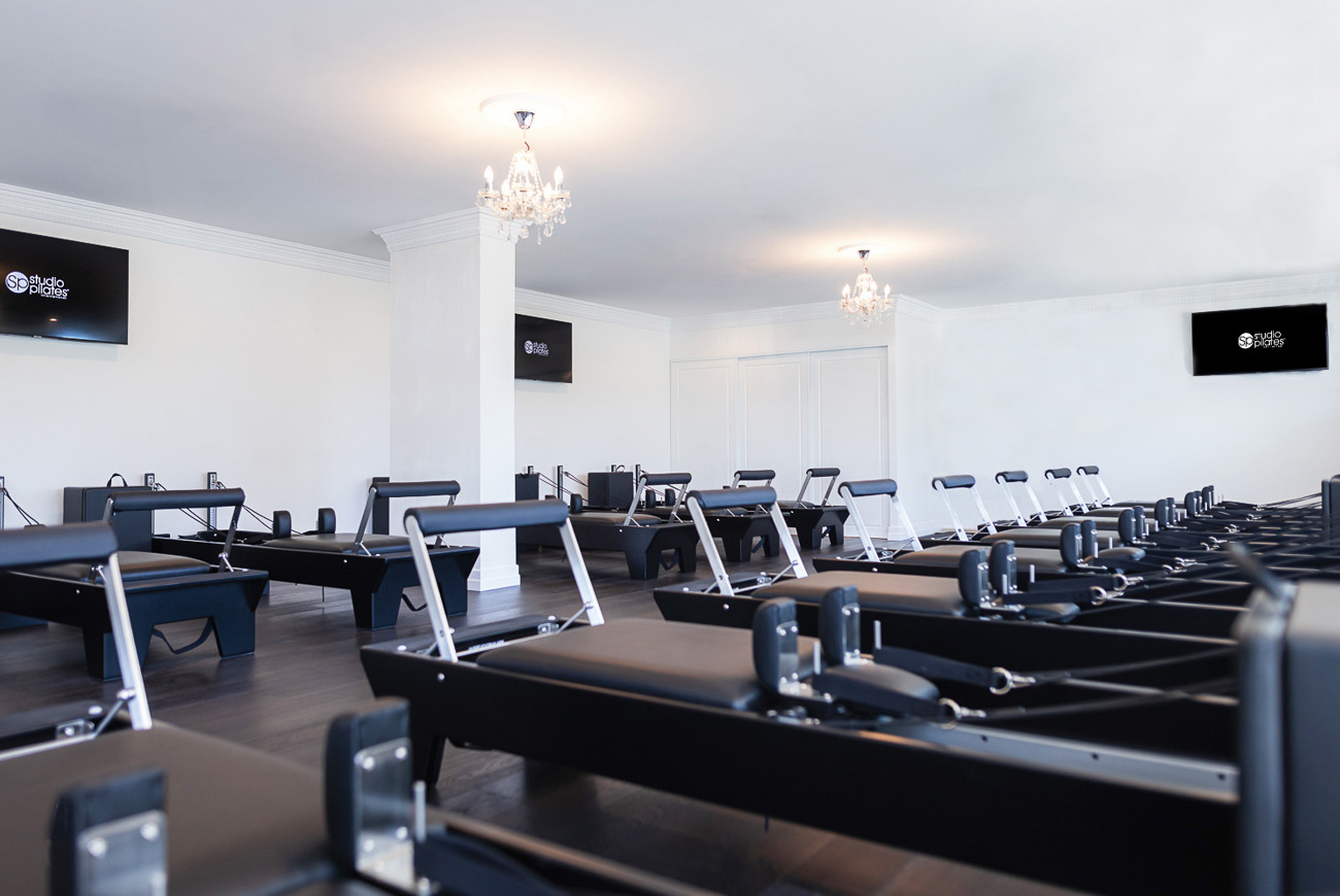 Pilates Studio Reformer Machines Chandeliers