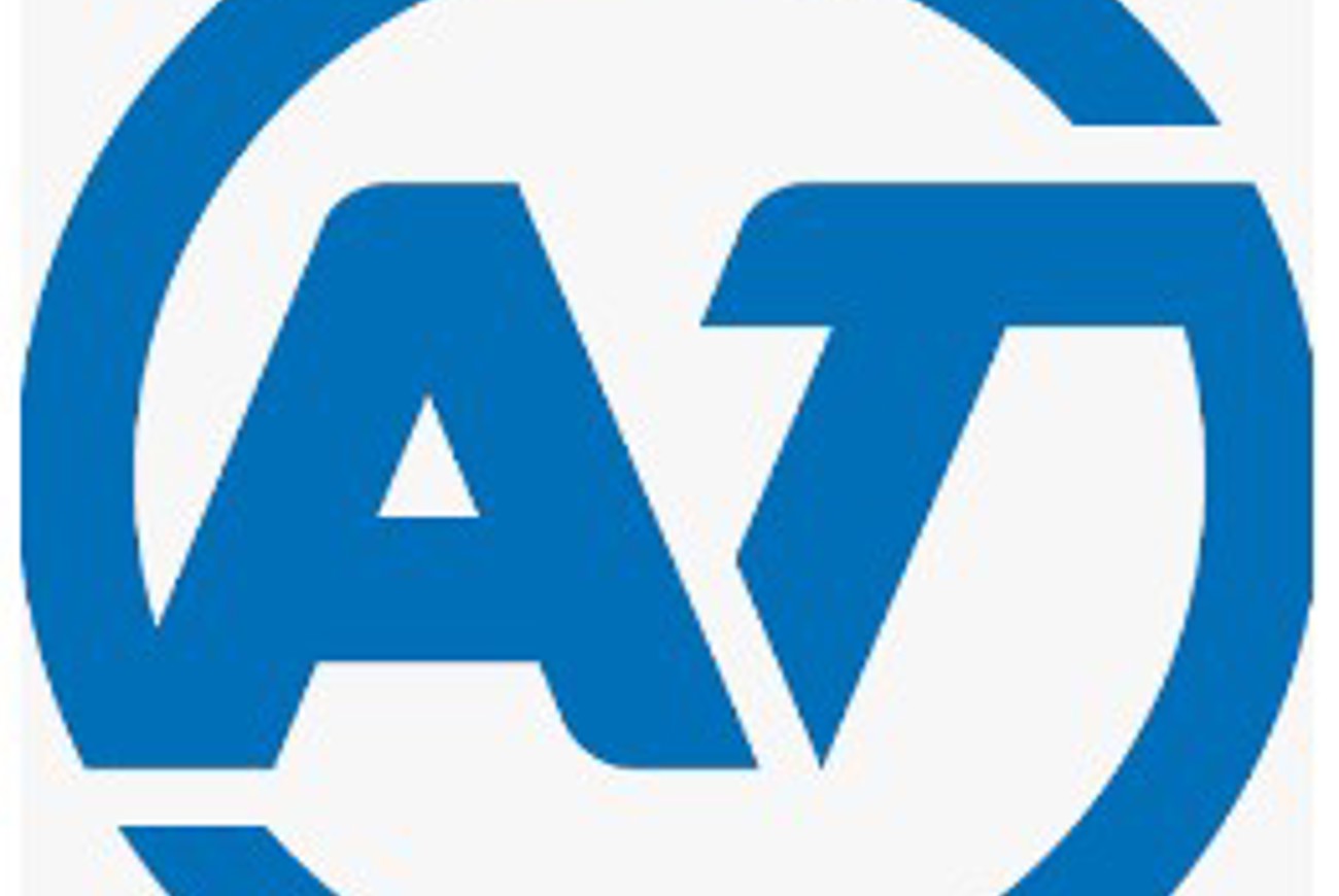 AT